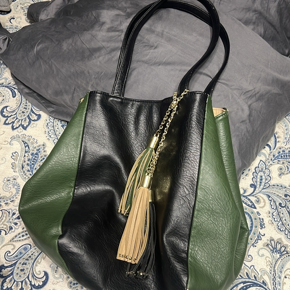 Gorgeous green and black man made leather bucket bag with 3 tassels